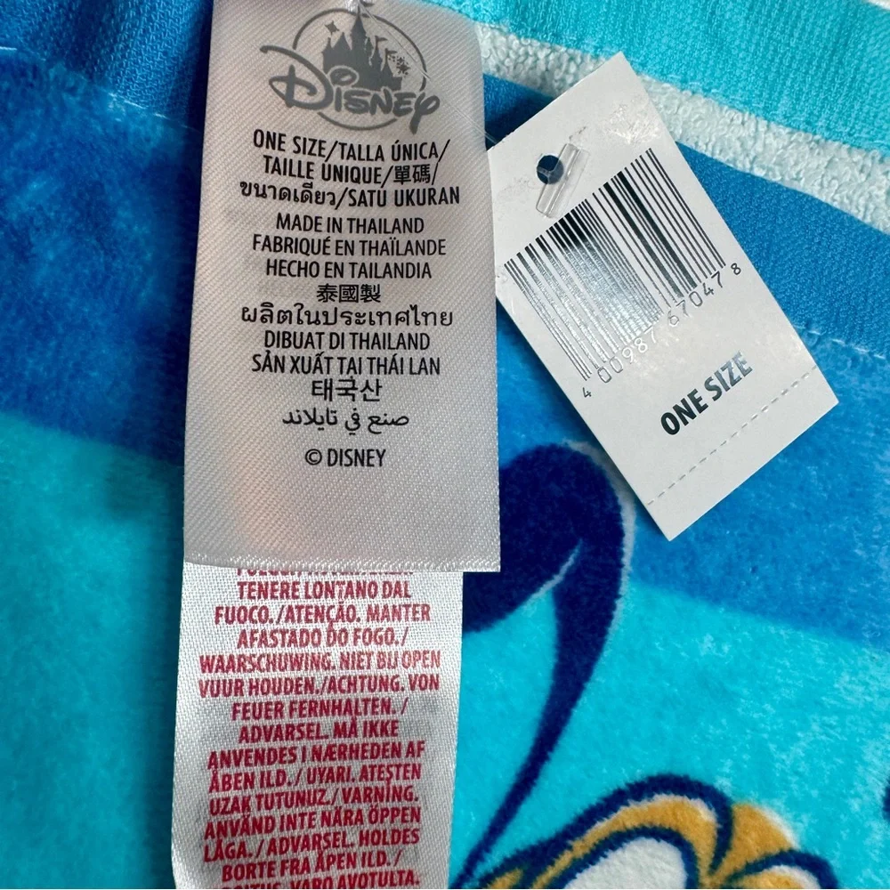 NWT. Disney beach towel featuring Mickey Mouse and others. “FUN IN THE SUN
